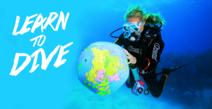 PADI Open water diver in tropical water with New Horizons Cheshire